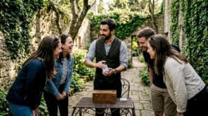 Magician performing magic on historic tour outdoors
