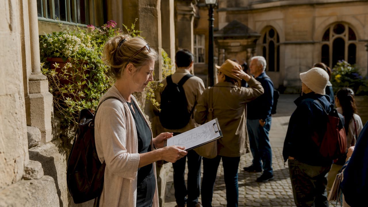 Tour guide planning group walking tour outdoors